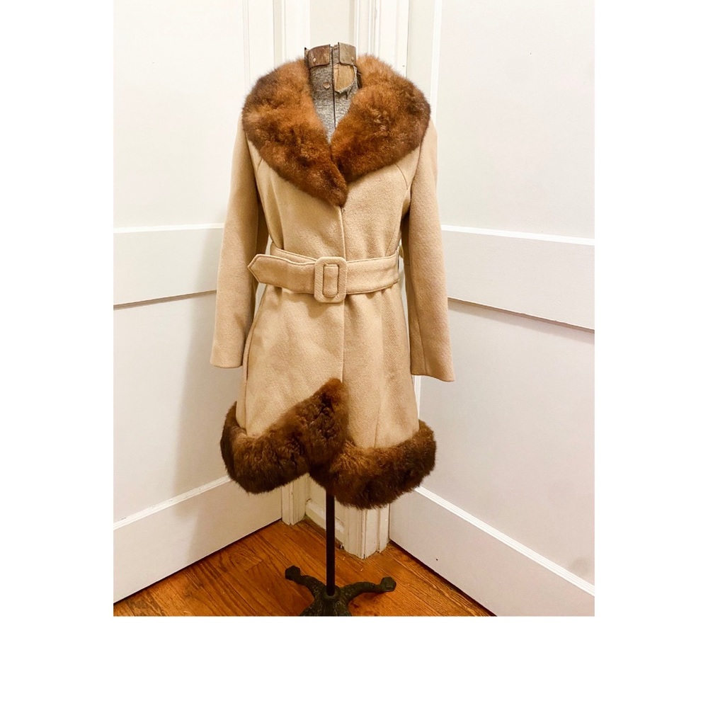 Single breasted tan wool coat with Mink trim.